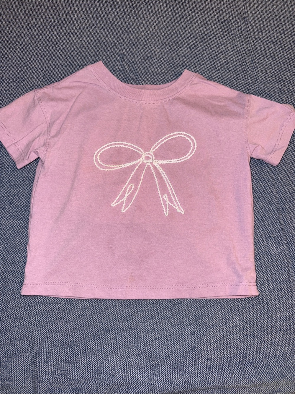 Girls Short-Sleeve Purple Tee with White Bow Graphic
